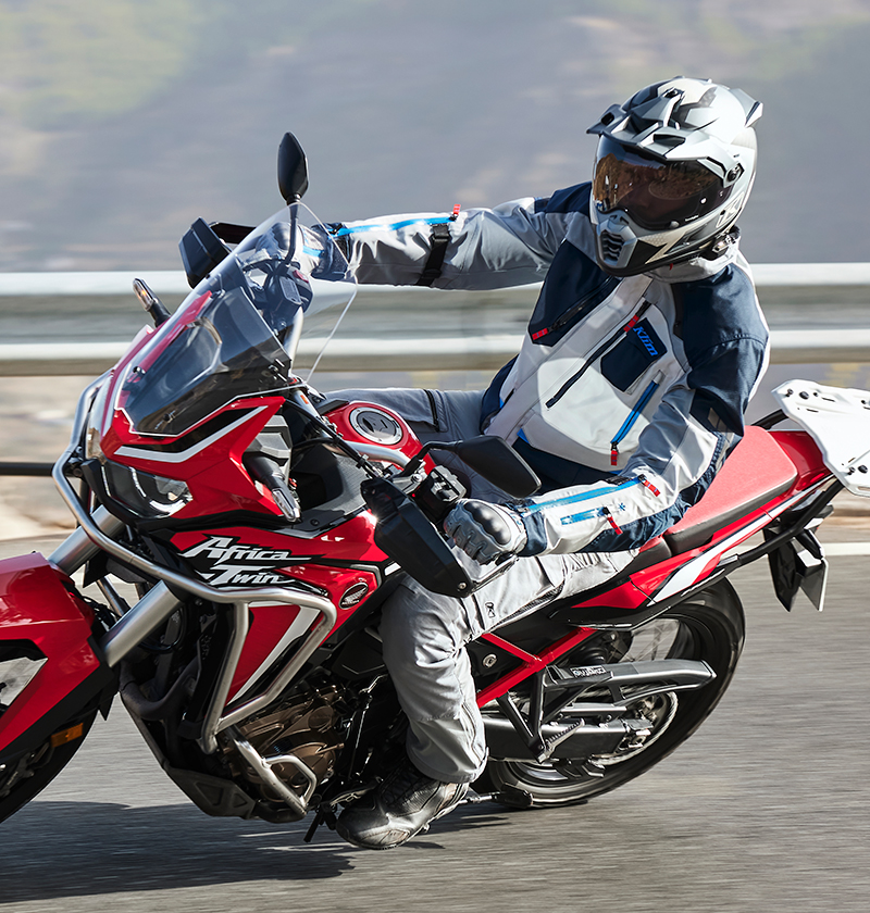 Guy wearing Klik Carlsbad on Africa Twin